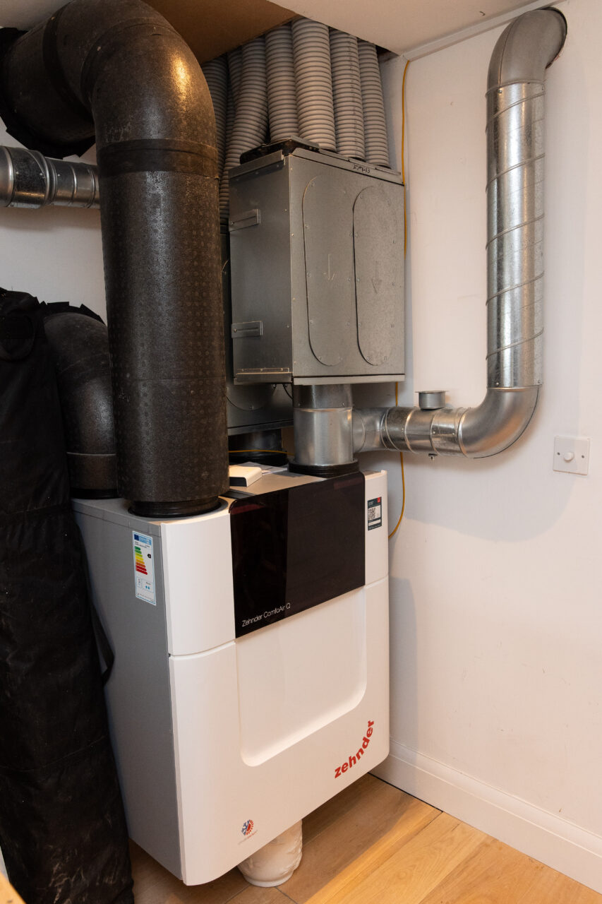 a vertical photo of the mechanical ventilation unit inside a home.