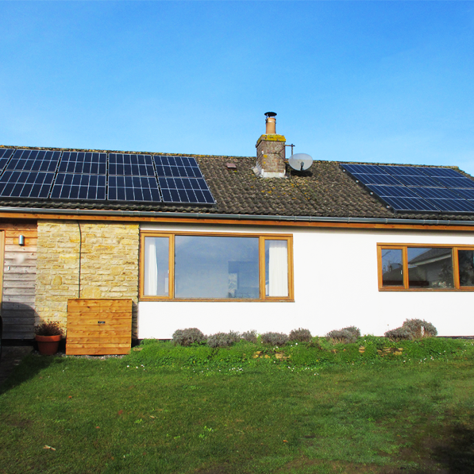 bungalow with solar panels on the roof