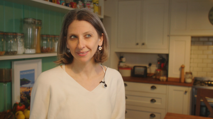 Rachel standing in her kitchen