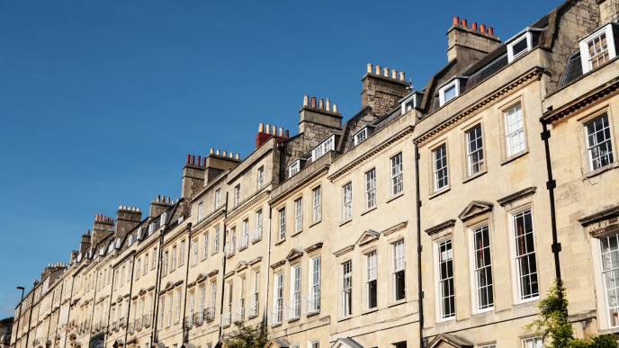 sandstone Bath buildings in a row with a blue sunny sky