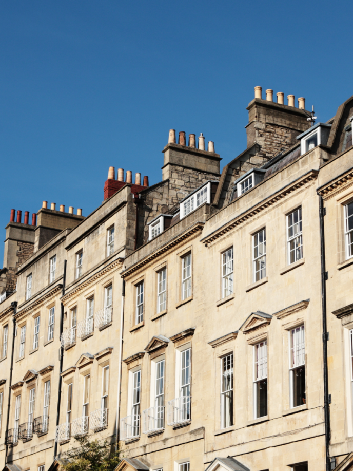 sandstone Bath buildings in a row with a blue sunny sky
