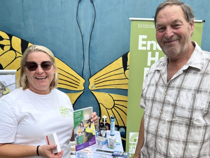 Bristol Energy Network stand at an event, giving energy efficiency advice