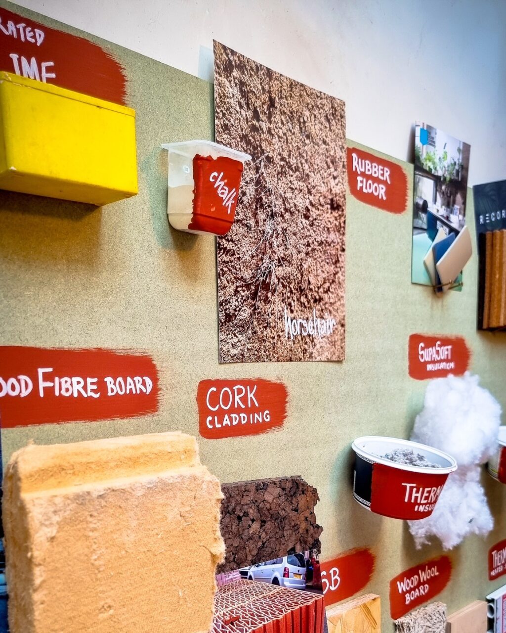Display of natural materials that were used as part of a whole house retrofit by Hugo and Mary.